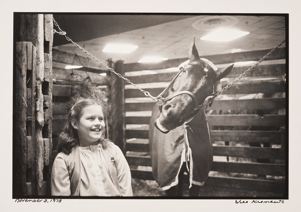 BETTOR DAYS Ax stayed close to the track, and to his daughter—which often placed young Megan in equine company.